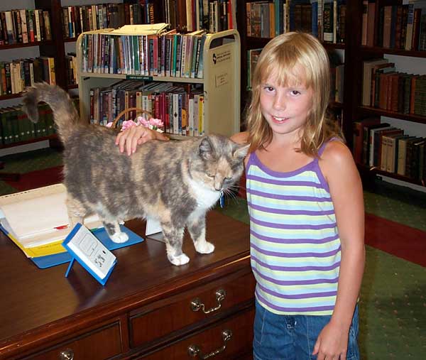 Sarah with Emily, the Library Cat