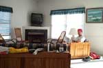 Ray reading in the living room of the beachhouse at Kitty Hawk, NC.