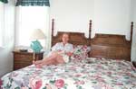 Jenny reading in her room at the beachhouse.