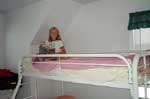 Sarah in her bunkbed at the beachhouse in Kitty Hawk, NC.