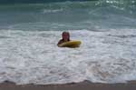 Sarah with boogie board in the surf.