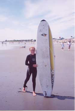 Sarah taking surfing lessons in Hampton, NH.  The water is cold!