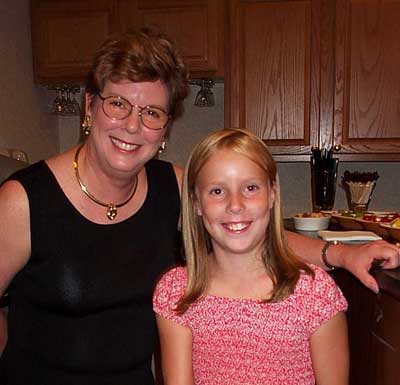 Sarah with Aunt Candace at Grandma Jenny's 80th birthday.