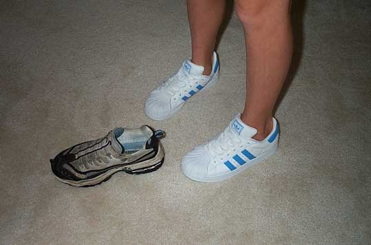 Sarah showing off her new shoes that Grandma Jenny bought her.