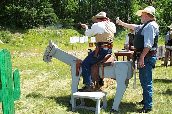 Shooting rifle from horseback...