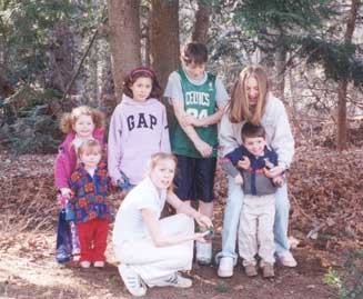 Sarah with cousins on Easter after Easter Egg Hunt.