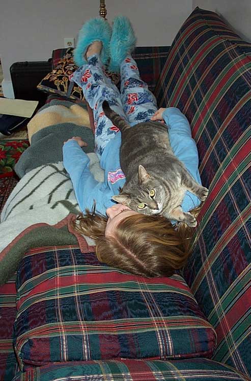 Sarah with her cat, Princess on a lazy Sunday morning.