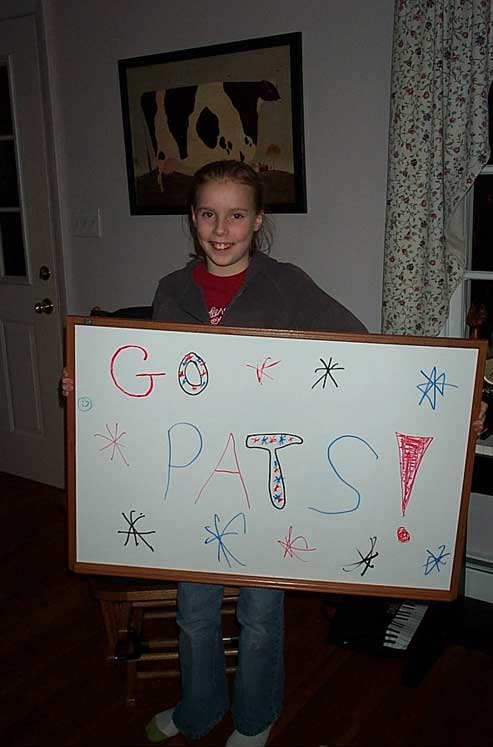Sarah with her sign for the New England Patriots.