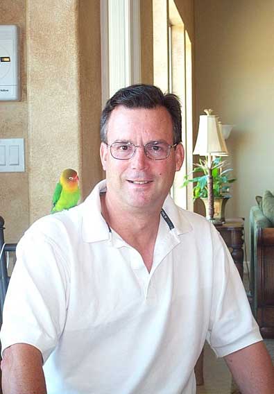 Ray with bird on shoulder in California in August 2005.