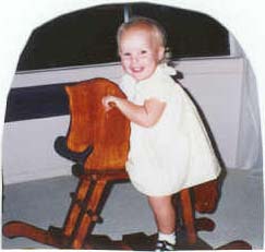 Sarah on rocking horse